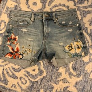 Flower embroidered cutoff jean shorts